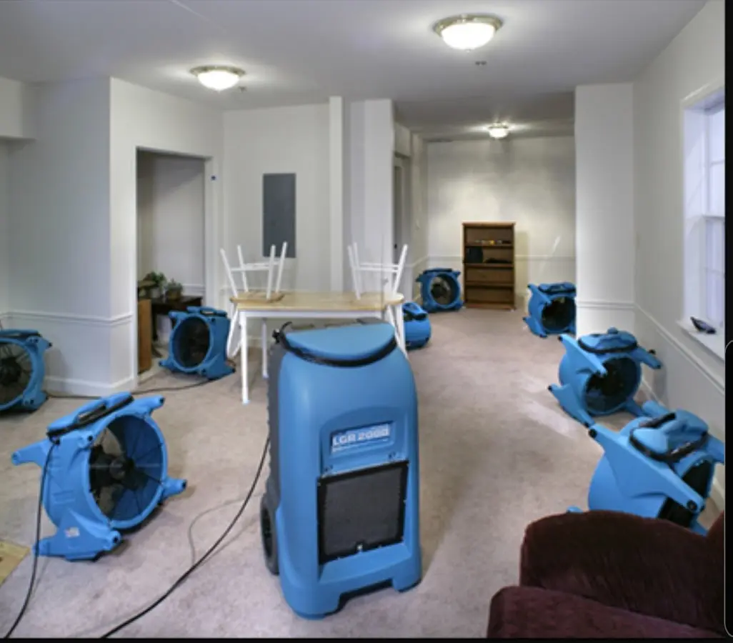 Air movers and dehumidifier setup for Water Damage Restoration in Country Club Estates